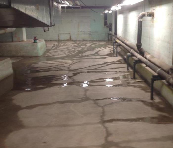 Water on floor in basement area.